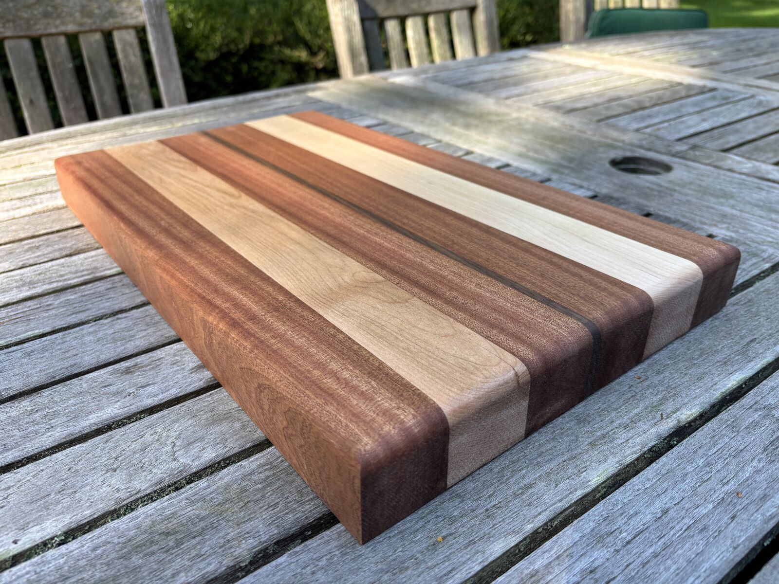 Walnut and maple striped cutting board